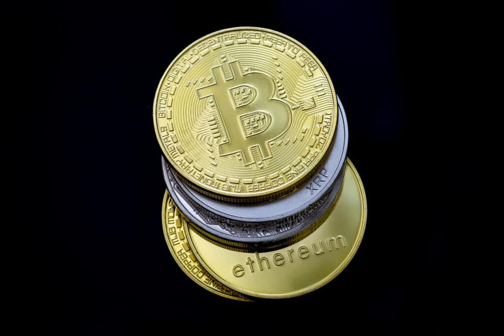 Stack of Bitcoins, Ethereum, Litecoin, Ripple and other cryptos